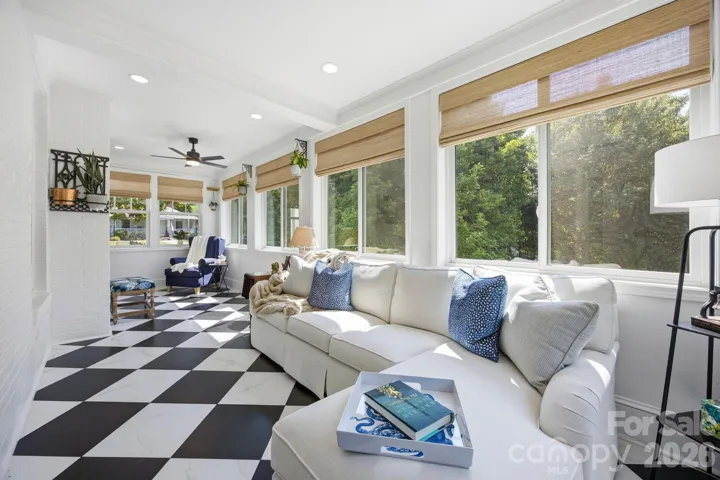 Newly completed sunporch with a view of backyard