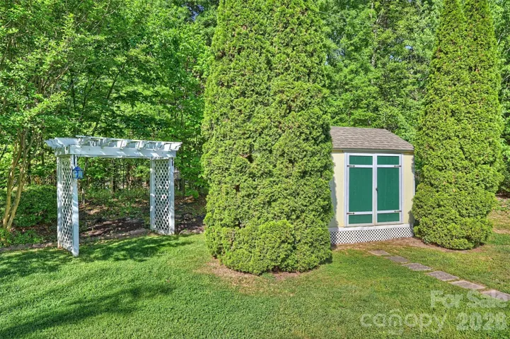 Shed backing up to wooded lot 