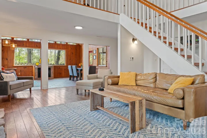 Spacious living room open to the family room/dining area