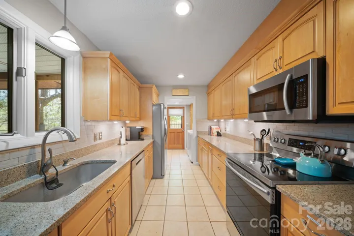 Kitchen with laundry room attached