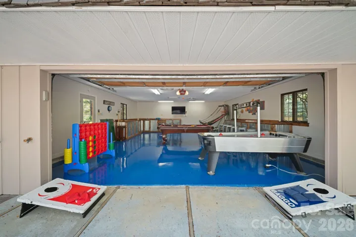 Speaking of garage! This one has been transformed into a game room/entertainment hub