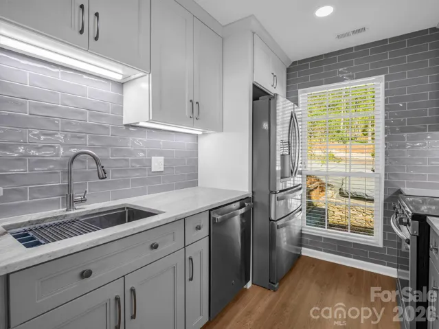 Tile backsplash and solid surface counters