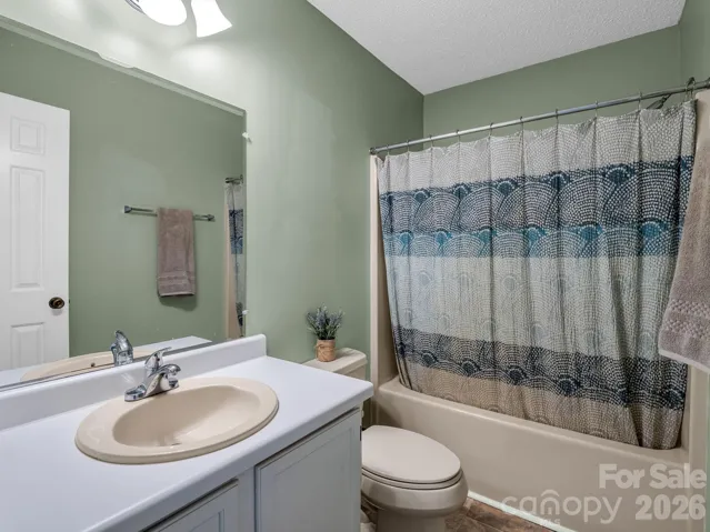 Guest bathroom on the upper level with tub/shower