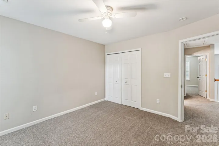 Secondary bedroom with backyard view