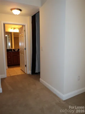 Walk-In Closet & Entrance To The En-Suite Bath...