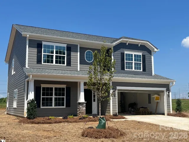 Beautiful 5 BR 3 1/2 BA w/Main Level Inlaw Suite