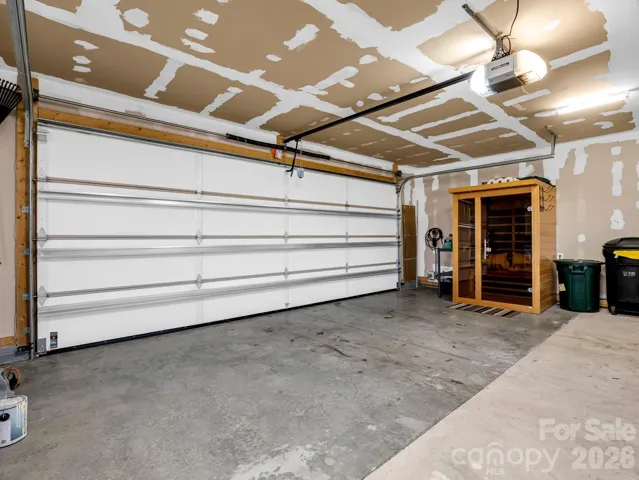  A 2-person sauna is in the oversized two-car attached garage with Level 2 EV (240v charging).