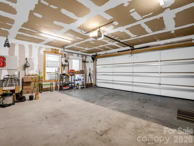 Oversized two-car attached garage with 2-person sauna and Level 2 EV (240v charging).