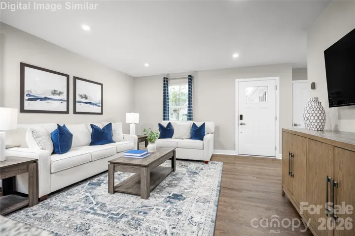 Step through the front entrance and you’re immediately greeted by a sense of openness and warmth. This great room is more than just a living space—it’s a statement.