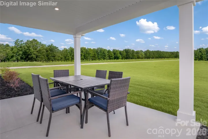 Your year-round hangout - covered porch for comfort and connection.