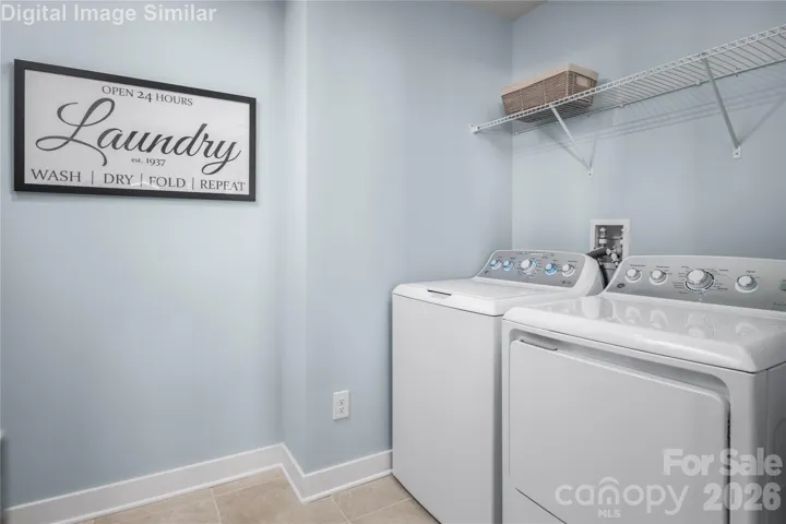 Main-level laundry - convenient to the primary bedroom.  Washer and Dryer optional.