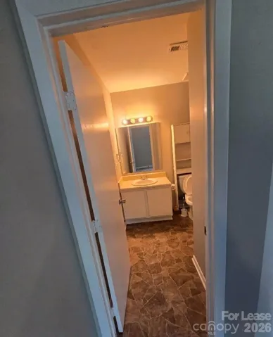 Second Bedroom - Bathroom Entryway Perspective
