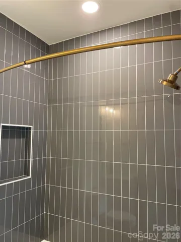 Secondary Bathroom - Tile to Ceiling w/ Shower Rod