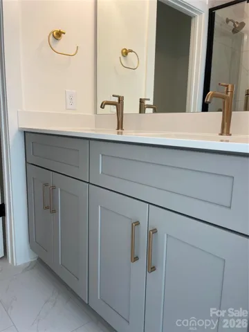 Gold Fixtures - Primary Bathroom