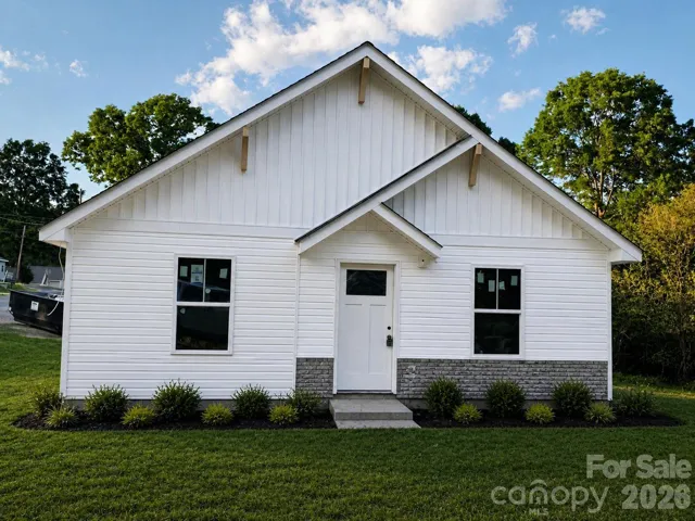 Adorable & Affordable New Construction Bungalow - example landscaping and stone accent