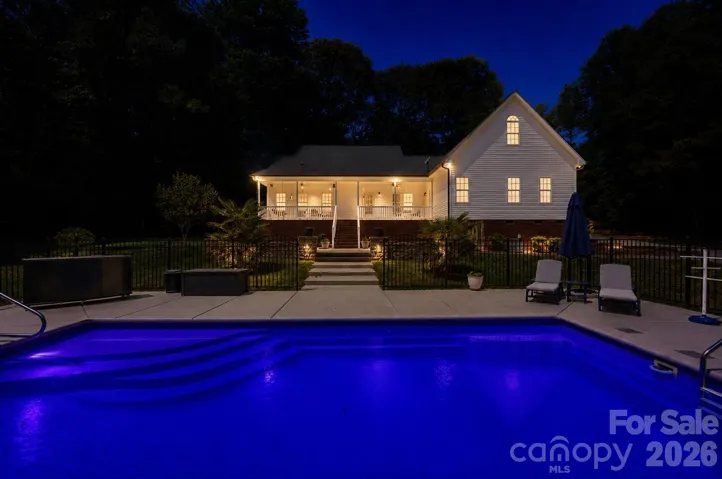 Twilight at the pool on 3.5 private acres