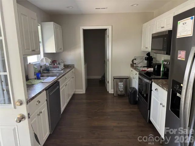 Kitchen Area & Utility/Laundry Closet at endof view
