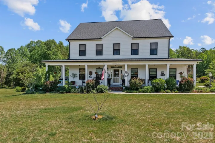 Modern farmhouse charm + incredible diverse trees and bushes make this a wonderful & peaceful place to call home
