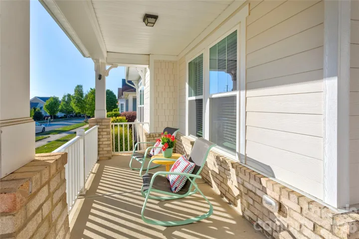 The shady front porch invites you to sit down and stay awhile