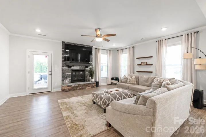 Spacious Living Room with Gas Log Stone Fireplace