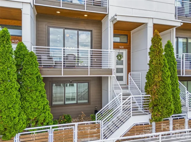 Privacy trees border each connection between homes