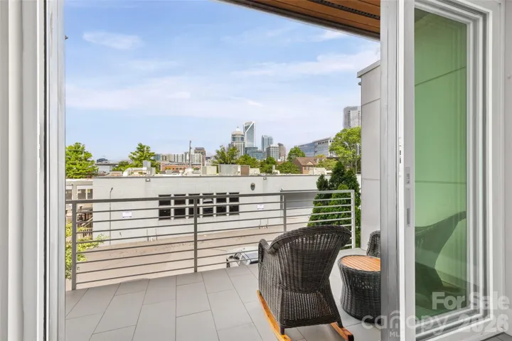 Main level covered balcony with sliding doors