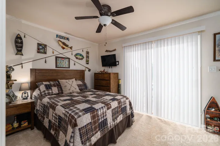Bedroom that leads out onto the deck to pool.  It can also be used as an office or exercise room.