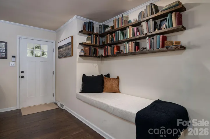 Reading nook in living room with storage under the seat.