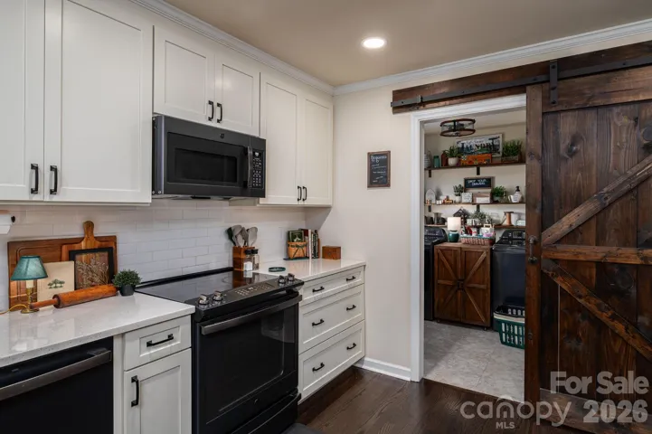 Looking from the kitchen to laundry room.