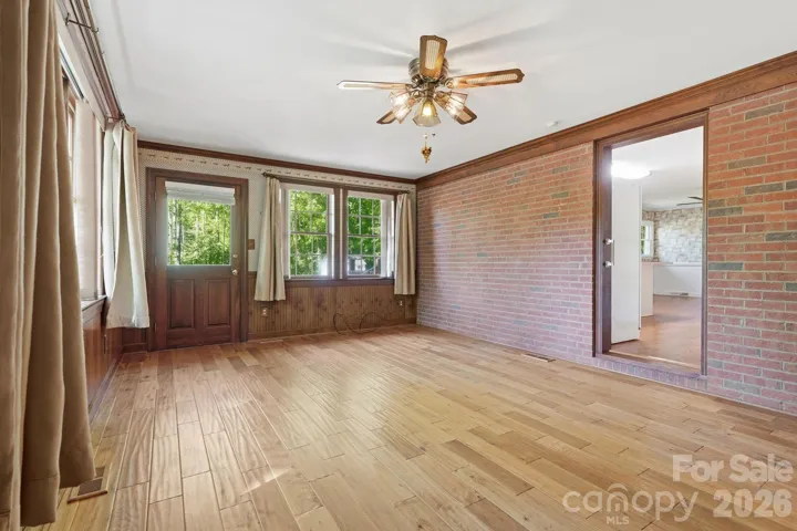 Door leads outside to brick patio.
