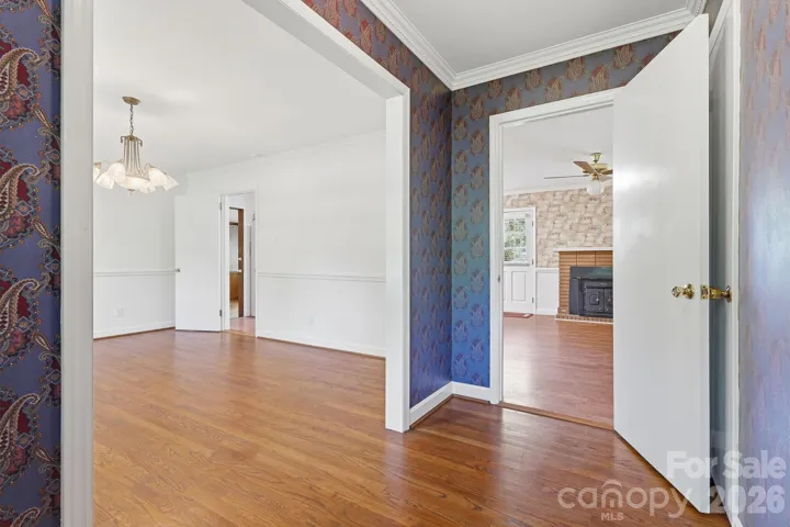 Foyer leads to formal living and to great room/kitchen.