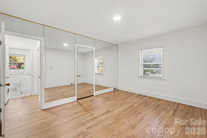 Bedroom with refinished white oak flooring