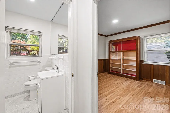 Second full bathroom updated with neutral colors and conveniently located beside bedroom two