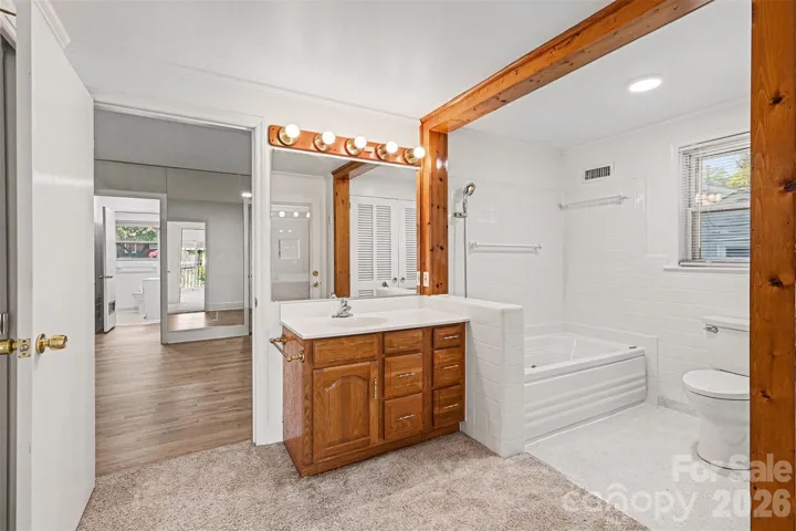 Tub is jetted and there are two large closets for storage