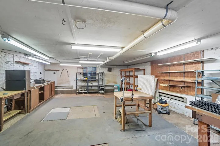 This workshop is over 800 square feet!  This area has endless possibilities and could be finished for an ADU, He/She shed, art studio or large gameroom.  Make it yours!