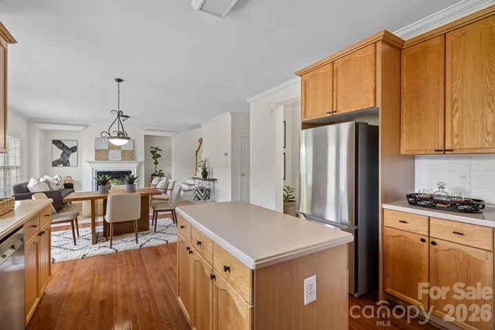 Open kitchen, dining and living areas