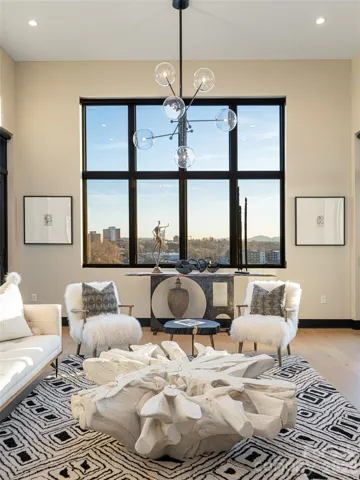 Expansive Great Room Window offers 180 degree view of the Blue Ridge Mountains and Asheville's South Slope area