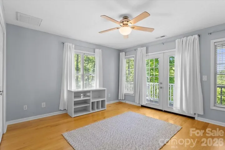 Upstairs bedroom 2 w/balcony and view