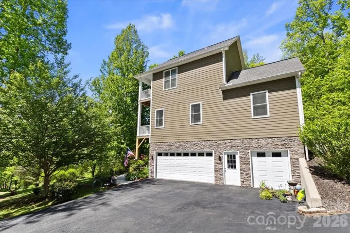 2 car garage w/second door for mower etc.