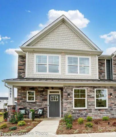 Homesite 218 features an end-unit Cary N floorplan