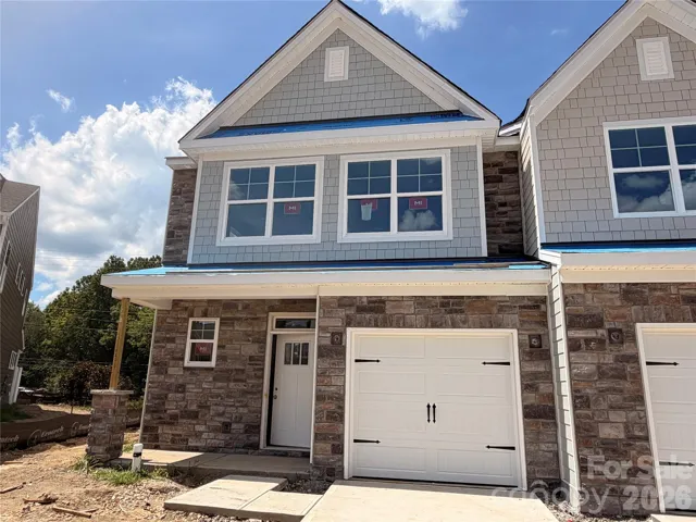 Homesite 218 features an end-unit Cary N floorplan