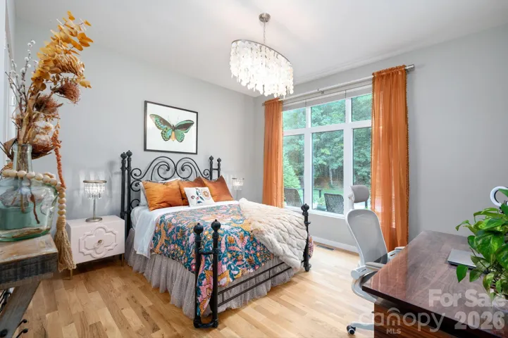 Bright guest retreat with  large window overlooking the front yard.