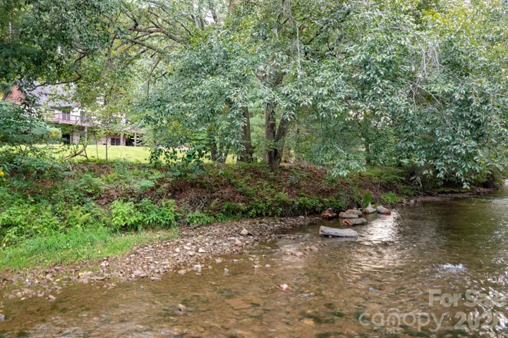 Peaceful community riverfront for fishing, wading, or simply relaxing by the water.