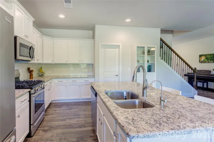 Stainless steel appliances including gas range