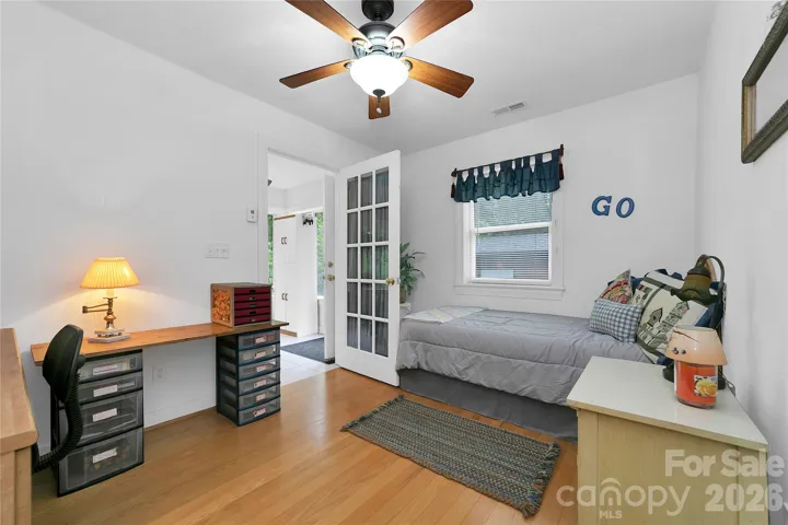 Also on the garage side of the house are three more bedrooms and another full bath. Three bedroom septic system, but actually 4 bedrooms in the house. This fourth bedroom is being used as an office with a bed.