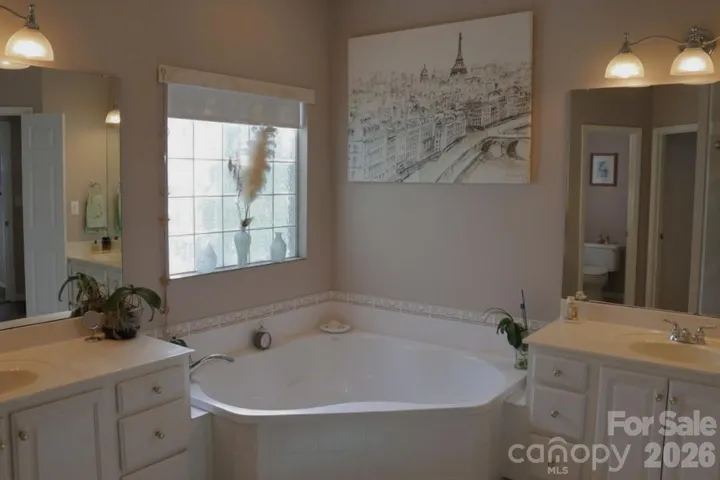 Master Bathroom with soaking tub and Dual Vanities