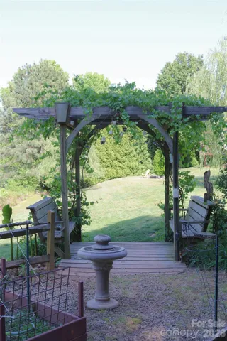 Back of the Arbor with benches to enjoy your garden and Lake Nixon