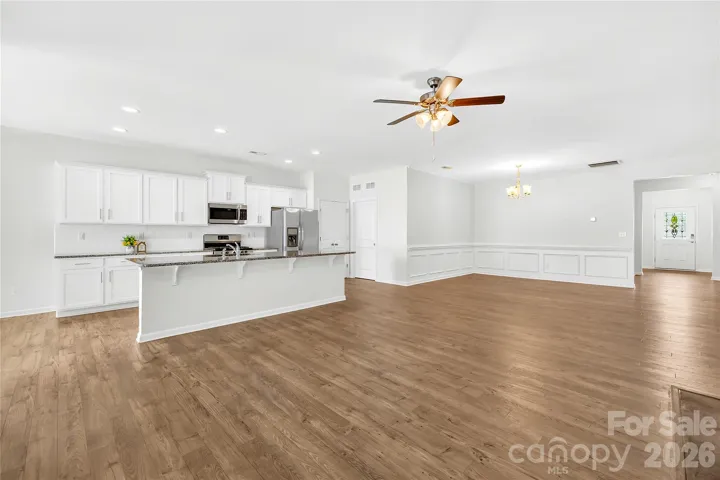 Luxury vinyl plank throughtout living area and bedrooms