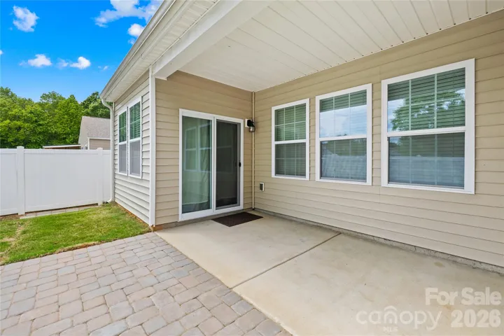 Extended patio is partially covered