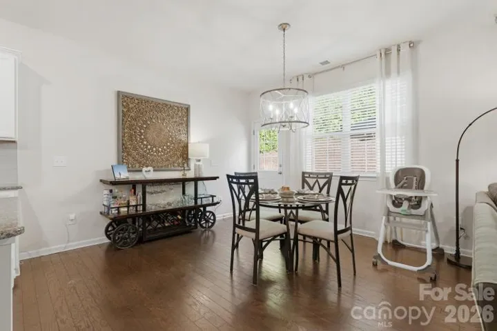 Spacious dining area with door to outside patio